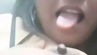 Desi bhabi self boobs press and licking boobs and her own finger selfie clip for lover