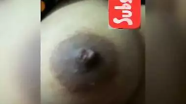 Young Indian woman shows off her XXX tits for online fan on phone camera