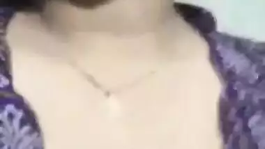 Bengali girl sucking her own boobs