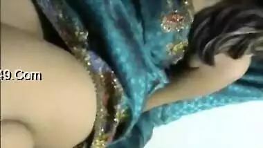 Solo Indian babe in a luxurious dress is excited so she touches tits