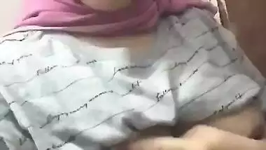 Young babe showing her Big Milk Tankers and Brown Tits