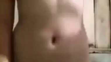 Indian girl stands in front of camera and deletes XXX clothing items