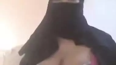 Pretty Desi beauty in hijab demonstrates massive XXX jugs on camera