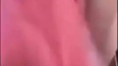 Indian chick in a red robe bares her natural XXX breasts to the sex fan