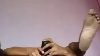 Desi girl stripping and masturbating with a big black dildo