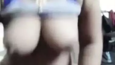 Naughty Desi bhabhi shows tits and fingers her XXX twat on camera