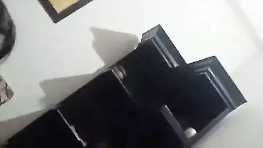 The lady gives a desi blowjob to the man on the couch