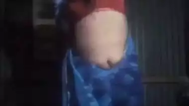 Desi bhabhi stripping saree and showing boobs