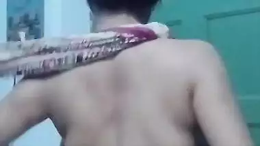 Saree without a bra and a blouse.